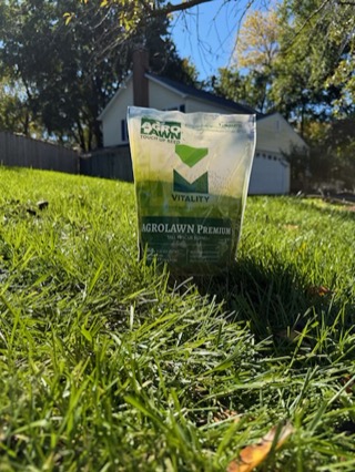 AgroLawn Premium tall fescue blend touch-up seed bag on a Maryland lawn